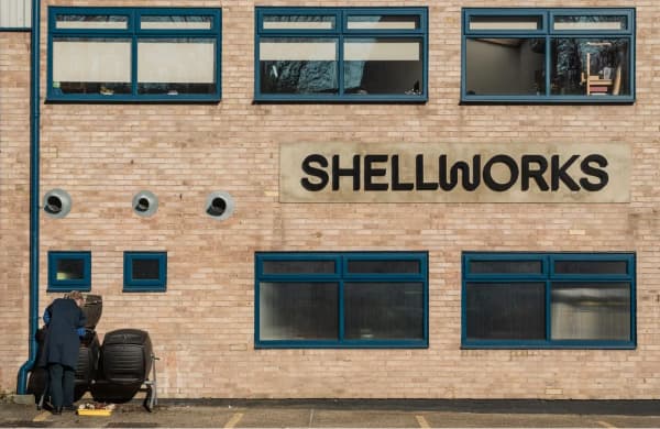 A light-industrial building with 'Shellworks' signage